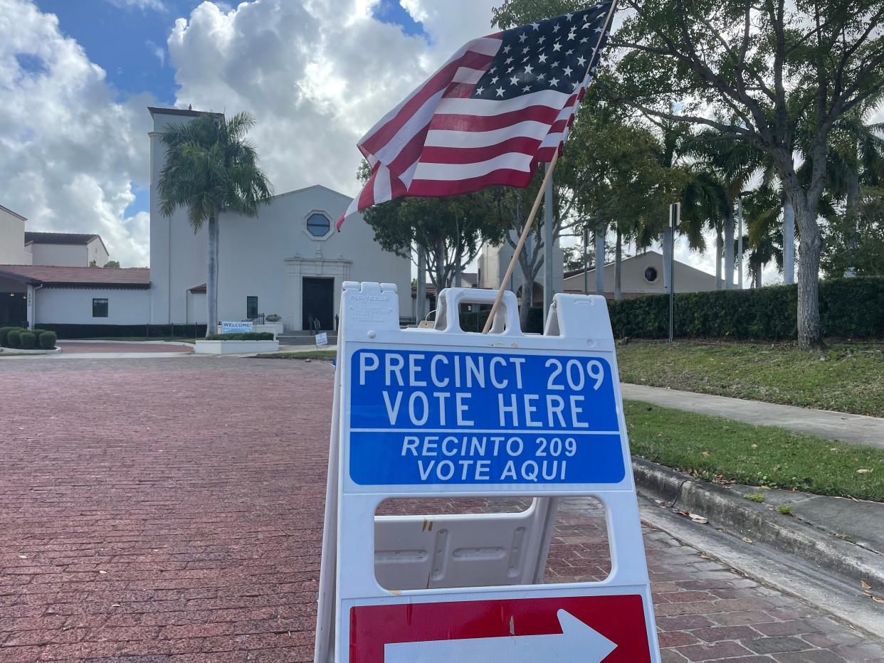 A sign directing voters to the parking lot for First Presbyterian Church, which is a polling place in the city of Sarasota.