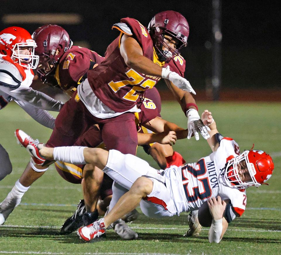 Weymouth's Naheen Ridore drops Milton's running back Peter Skutnik hard.

The Weymouth Wildcats hosted the Milton Wildcats on the gridiron on Friday, October 4, 2024