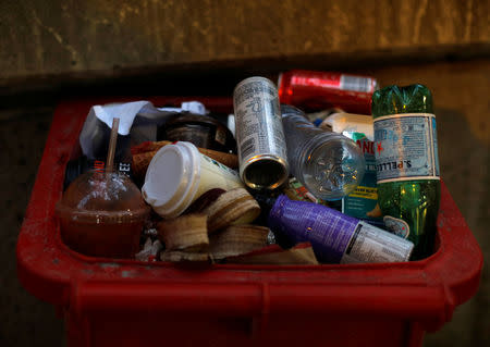 Rubbish piles up in a bin in Sydney, Australia April 27, 2018. REUTERS/Edgar Su