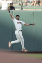 San Francisco Giants left fielder LaMonte Wade Jr. cannot make the catch on a double by Arizona Diamondbacks' Josh Rojas during the first inning of a baseball game Wednesday, June 16, 2021, in San Francisco. (AP Photo/Tony Avelar)