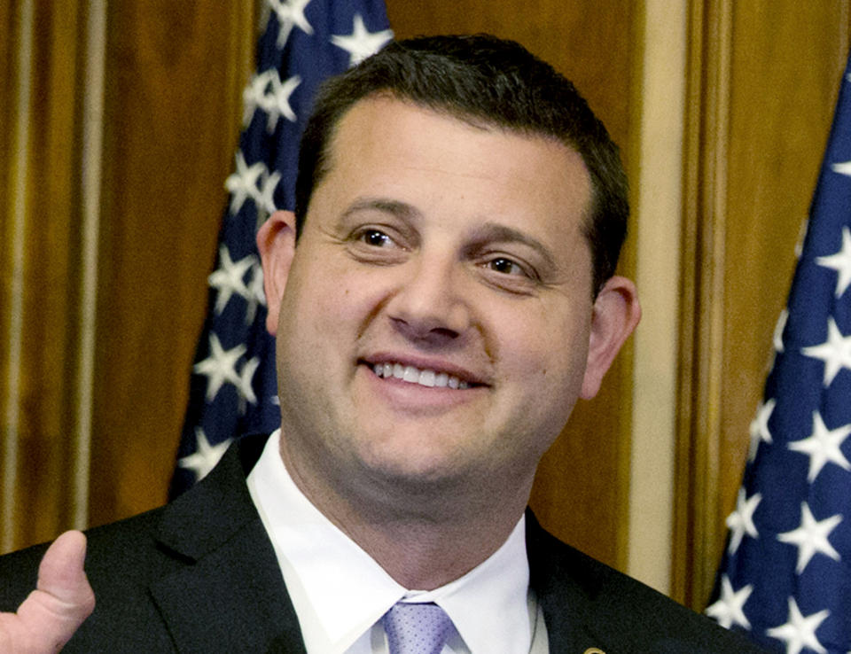 FILE – U.S. Rep. David Valadao, R-Calif., poses during a ceremonial re-enactment of his swearing-in ceremony in the Rayburn Room on Capitol Hill in Washington on Jan. 6, 2015. Valadao is running for reelection in California's 22nd Congressional District in 2024. (AP Photo/Jacquelyn Martin, File)