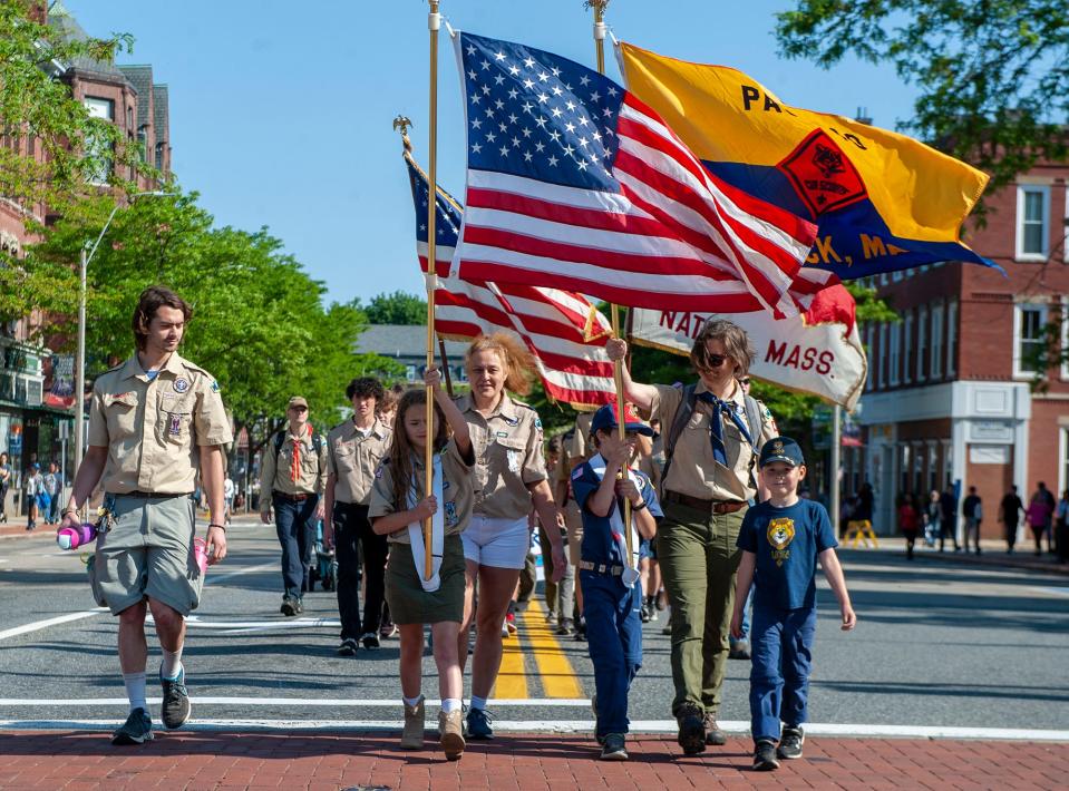 Scouts are shown marching in last year's Memorial Day parade in Natick, May 29, 2023.