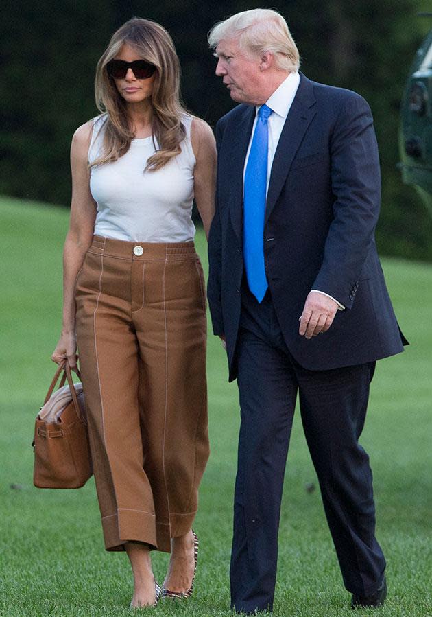 The First Lady was seen toting this AU$18K Hermès Birkin bag when arriving in Washington yesterday. She paired it with a Dolce and Gabbana tank, Bally culottes and Manolo Blahnik heels.