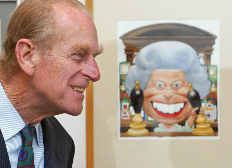 Duke of Edinburgh with cartoon of the Queen (2002)