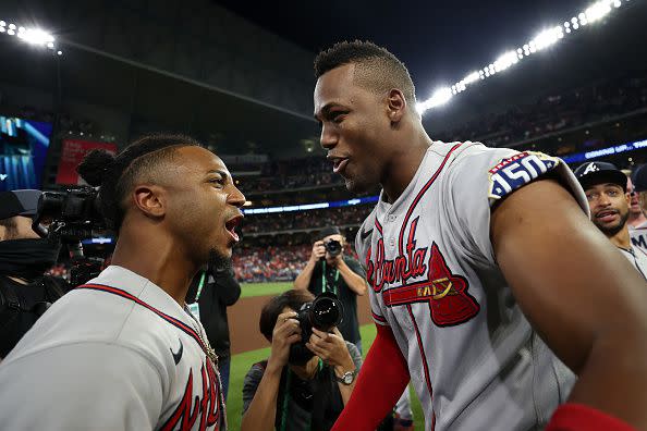 HOUSTON, TEXAS - NOVEMBER 02:  Jorge Soler #12 and Ozzie Albies #1 of the Atlanta Braves celebrate their 7-0 victory against the Houston Astros in Game Six to win the 2021 World Series at Minute Maid Park on November 02, 2021 in Houston, Texas. (Photo by Carmen Mandato/Getty Images)