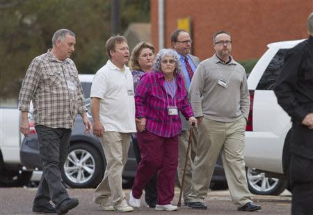 The family of slain Houston Police officer Guy Gaddis enters the "Walls" prison unit to witness the execution of Edgar Tamayo in Huntsville, Texas January 22, 2014. REUTERS/Richard Carson