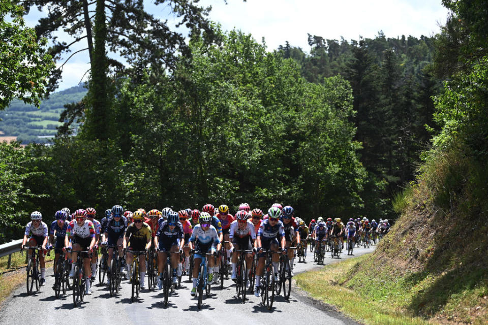 MAURIAC FRANCE  JULY 24 A general view of the peloton passing through a forest landscape during the 2nd Tour de France Femmes 2023 Stage 2 a 1517km stage from ClermontFerrand to Mauriac  UCIWWT  on July 24 2023 in Mauriac France Photo by Tim de WaeleGetty Images