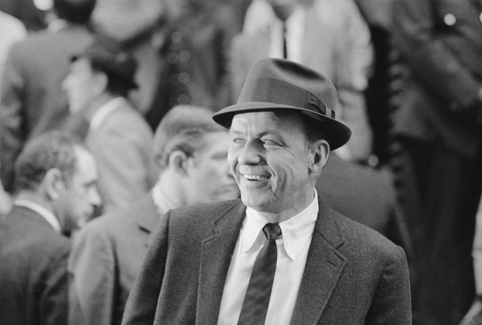 Frank Sinatra plays the title role in the film “The Detective,” outside New York City police station, Oct. 16, 1967. (AP Photo/Anthony Camerano)