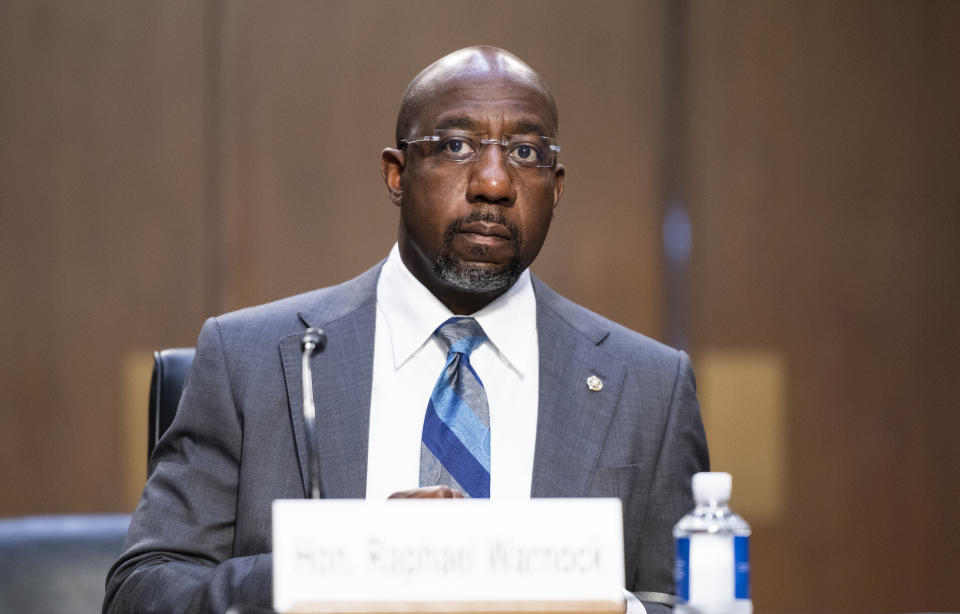 Sen. Raphael Warnock, D-Ga., testifies during a Senate Judiciary Committee hearing on voting rights on Capitol Hill in Washington, Tuesday, April 20, 2021. (Bill Clark/Pool via AP)