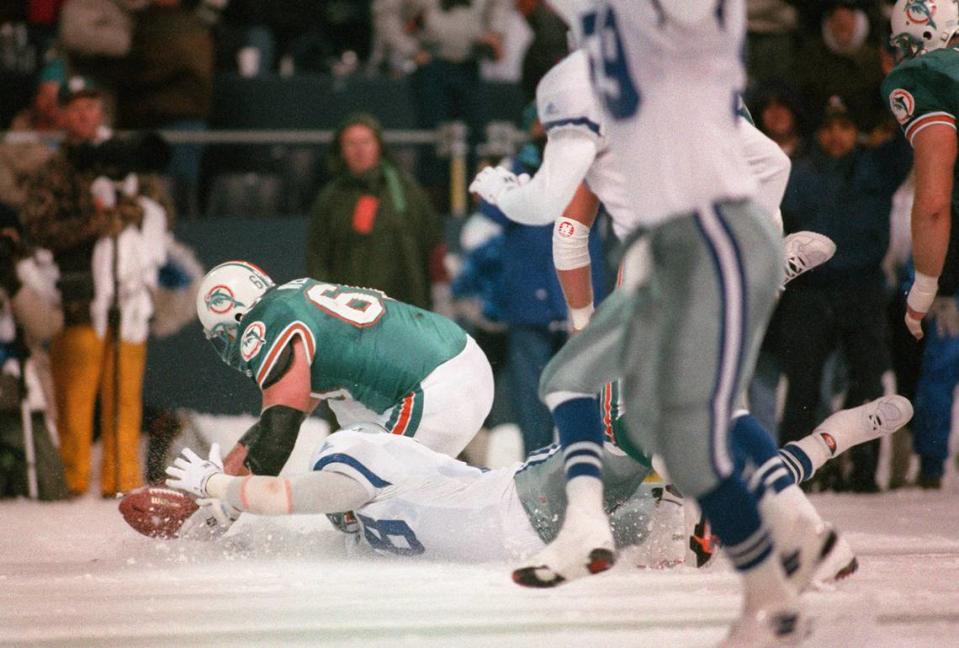 Star-Telegram archive photo from Thanksgiving Day 1993. Dallas Cowboys’ Leon Lett dives for a blocked fourth quarter field goal attempt as Bert Weidner of the Miami Dolphins scrambles for the ball Thursday, Nov. 25, 1993 in Irving , Texas. The live ball was recovered by Jeff Dellenbach of the Dolphins. Dolphins kicker Pete Stoyanovich then made the winning 19-yard field goal as time expired giving the Dolphins a 16-14 victory.