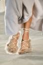 <p>This season's furry footwear trend—seen at Altuzarra, Miu Miu, and Fendi—offers a solution to easing back into heels after spending so much time in slippers over the last year.<br></p>