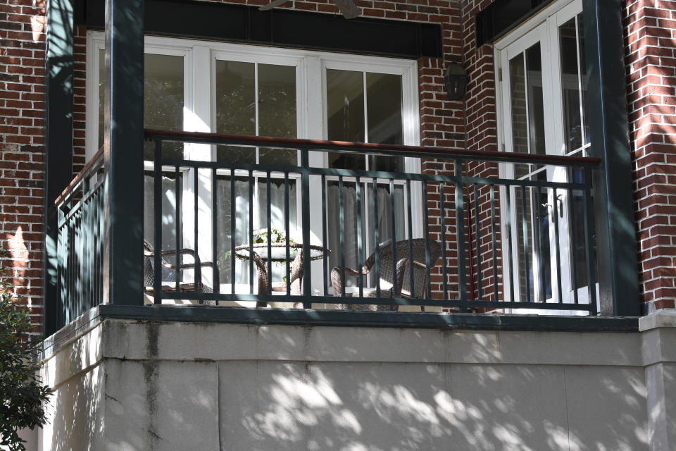 This photo shows the outside of a Charleston, S.C., condominium belonging to Eugene Zurlo on Monday, Oct. 19, 2020. The Trump administration recently gave the longtime Republican political donor seed money to test a possible COVID-19-fighting blood plasma technology, noting Zurlo's "manufacturing facilities" in Charleston. An AP investigation found no manufacturing facilities. The company operates out of Zurlo's condo. He and his partners may now be in line for as much as $65 million in taxpayer money. (AP Photo/Meg Kinnard)