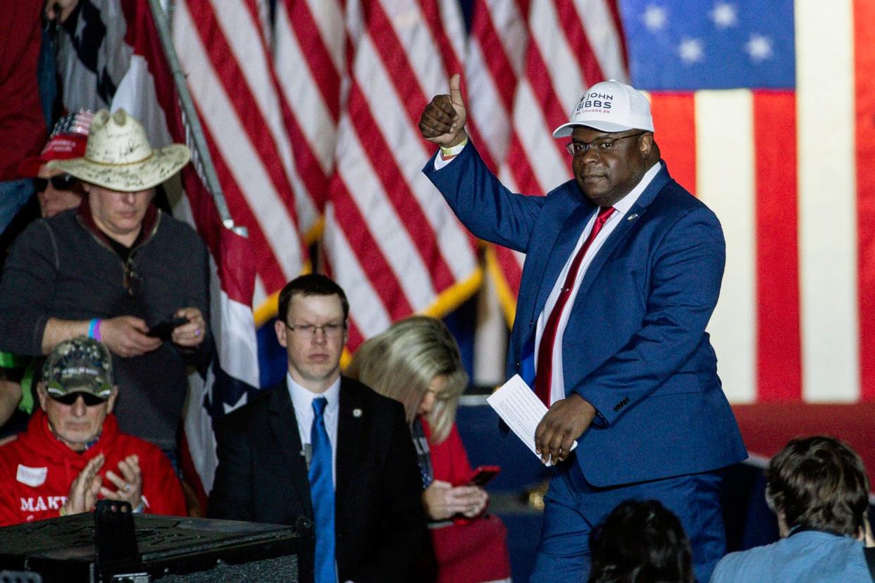 Republican House of Representative candidate John Gibbs speaks during a Save America rally at the Michigan Stars Sports Center in Washington Township on April 2, 2022.