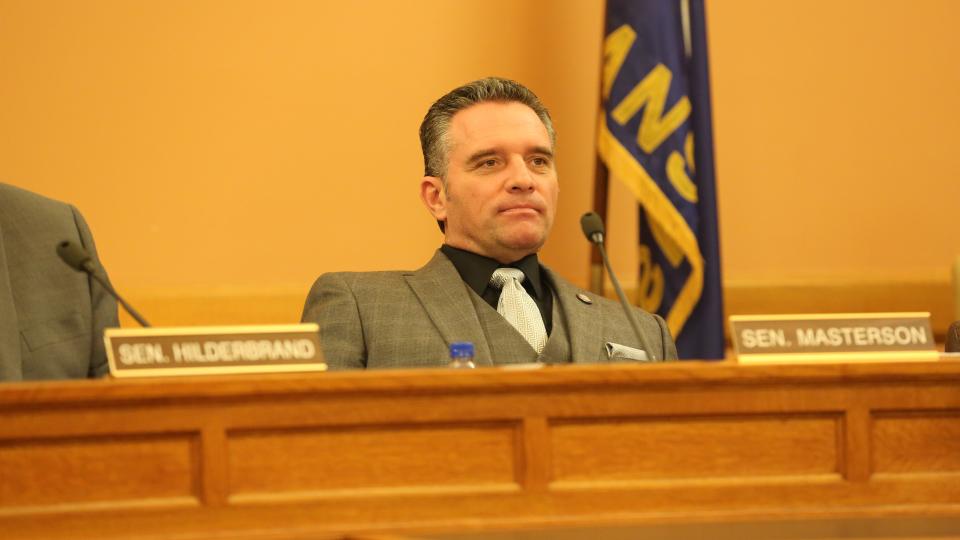 Senate President Ty Masterson, R-Andover, listens to testimony Thursday on a proposed Congressional map he introduced.