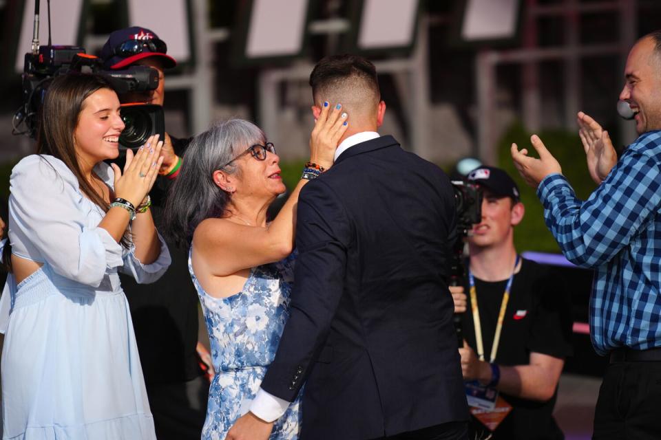 Zach Neto celebrates with family after being selected 13th overall by the Angels in the 2022 MLB draft at L.A. Live in July.