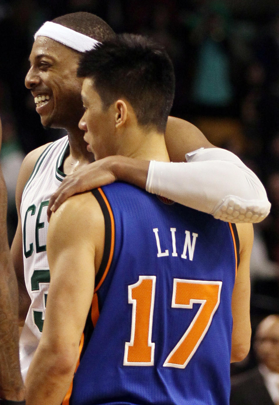 BOSTON, MA - MARCH 04: Paul Pierce #34 of the Boston Celtics hugs Jeremy Lin #17 of the New York Knicks after the game on March 4, 2012 at TD Garden in Boston, Massachusetts. The Boston Celtics defeated the New York Knicks 115-111 in overtime. NOTE TO USER: User expressly acknowledges and agrees that, by downloading and or using this photograph, User is consenting to the terms and conditions of the Getty Images License Agreement. (Photo by Elsa/Getty Images)