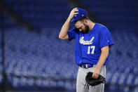 Israel pitcher Jake Fishman leaves the team's baseball game against the Dominican Republic at the 2020 Summer Olympics, Tuesday, Aug. 3, 2021, in Yokohama, Japan. (AP Photo/Matt Slocum)