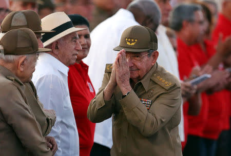 Cuba's President Raul Castro gestures as he arrives for the ceremony marking the 64th anniversary of the July 26, 1953 rebel assault which former Cuban leader Fidel Castro led on the Moncada army barracks, Pinar del Rio, Cuba, July 26, 2017. REUTERS/Alejandro Ernesto/Pool