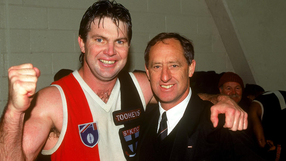 Danny Frawley of the Saints celebrates with coach Stan Alves after a AFL match between the St Kilda Saints and the Carlton Blues held at the Melbourne Cricket Ground, 1995 in Melbourne, Australia. (Photo by Getty Images)