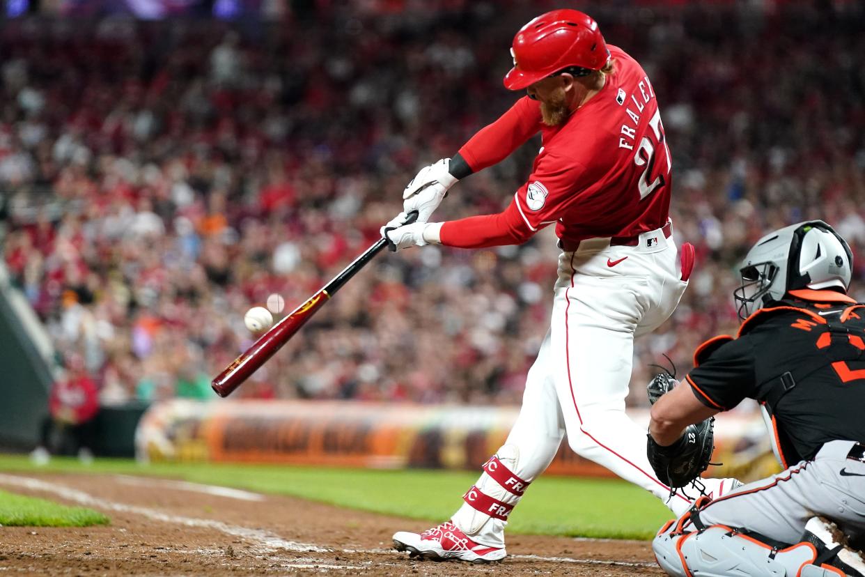 Jake Fraley singles in the Reds' ninth inning Saturday night. After being shut out 3-0 Friday night, the Reds didn't score until the ninth inning of Saturday's 2-1 loss, their fourth straight. Fraley, who was pinch-hitting, scored that run.