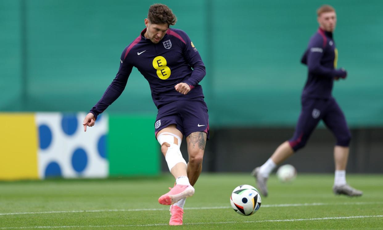 <span>John Stones sports extensive strapping on his right knee during England training, but is adamant the injury is not a concern.</span><span>Photograph: Eddie Keogh/The FA/Getty Images</span>