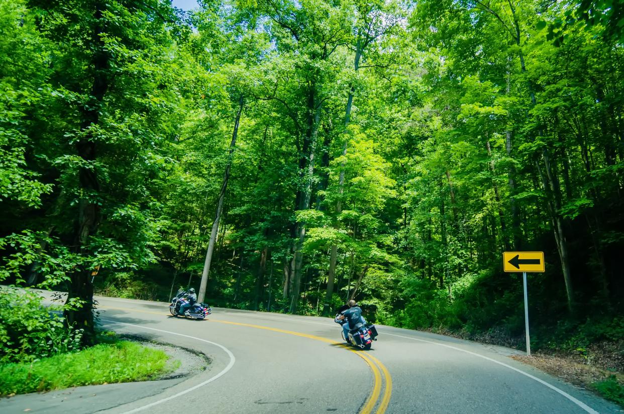 Two motorcycles on Tail of the Dragon Scenic Road, Great Smoky Mountains, Tennessee during summer