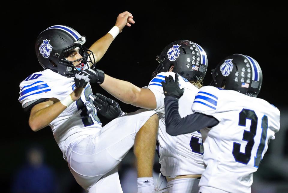 CVCA running back Ricky Levak, left, celebrates his second-half touchdown with teammates at Northwest on Sept. 30, 2022.