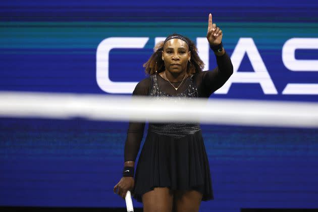 Williams waving her finger to stop the crowd from booing Kontaveit. (Photo: Al Bello via Getty Images)