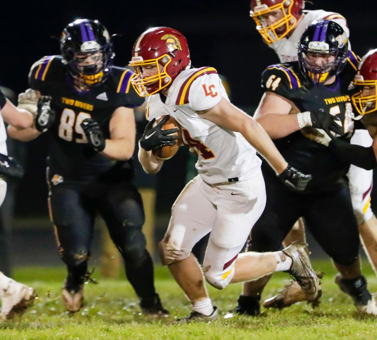 Luxemburg-Casco’s Andrew Klass (24) carries the ball against Two Rivers during a WIAA Division 4 quarterfinal football game Nov. 3 in Two Rivers.