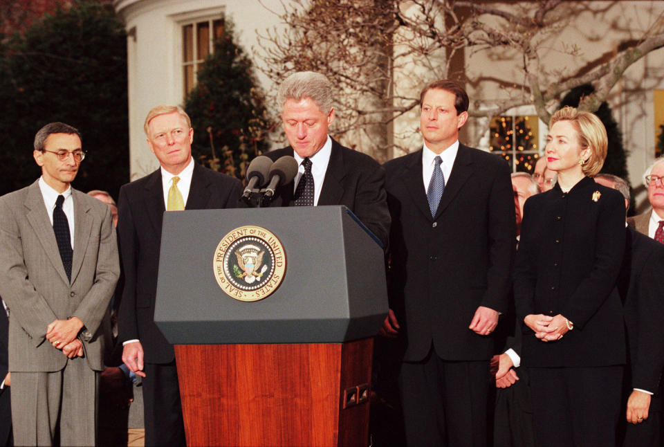 President Bill Clinton reacts to being impeached by the House of Representatives outside of the oval office in the White House Rose Garden, on Dec. 19, 1998.<span class="copyright">David Hume Kennerly—Getty Images</span>