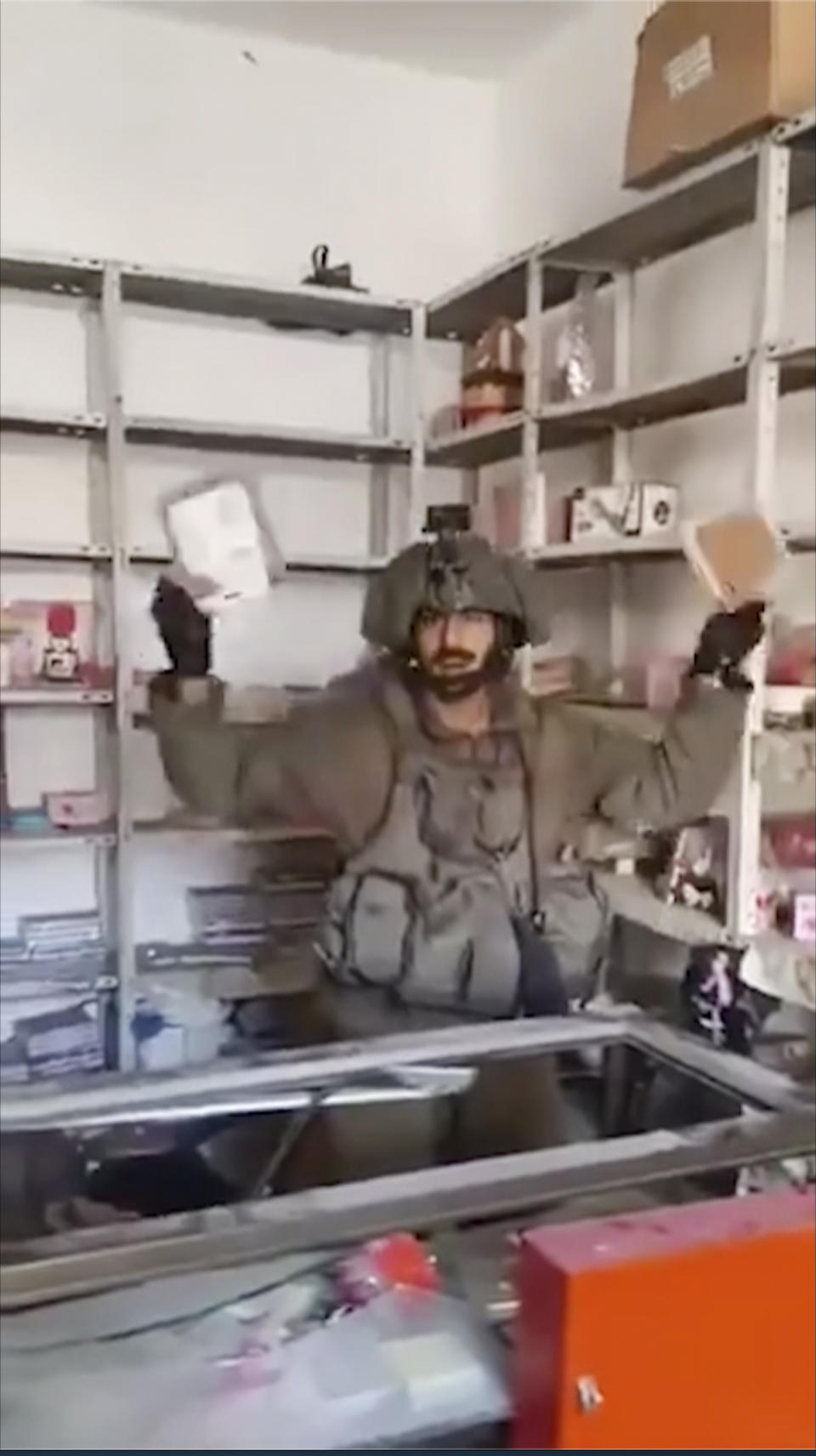 This image made from an undated video shared on X, formerly known as Twitter, shows Israel soldier rummaging through private homes in Gaza. Several viral videos of Israeli soldiers behaving inappropriately in Gaza have emerged in recent days, creating a headache for the Israeli military as it faces an international outcry over its tactics and the rising civilian death toll in its war against Hamas. (X via AP)