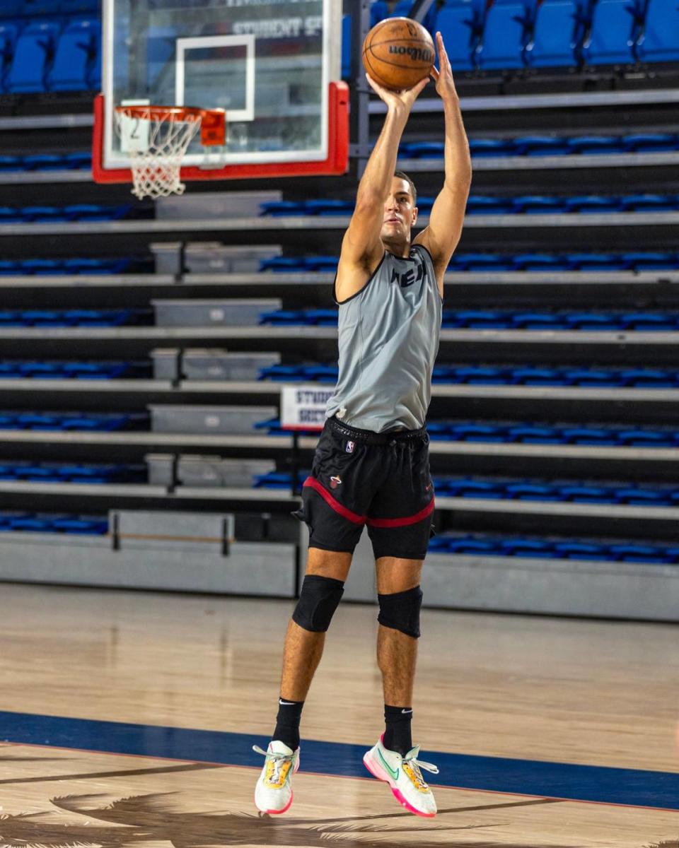 Miami Heat forward Cole Swider (21) shoots the ball during training camp at Florida Atlantic University’s Eleanor R. Baldwin Arena in Boca Raton, Florida, on Tuesday, October 3, 2023.