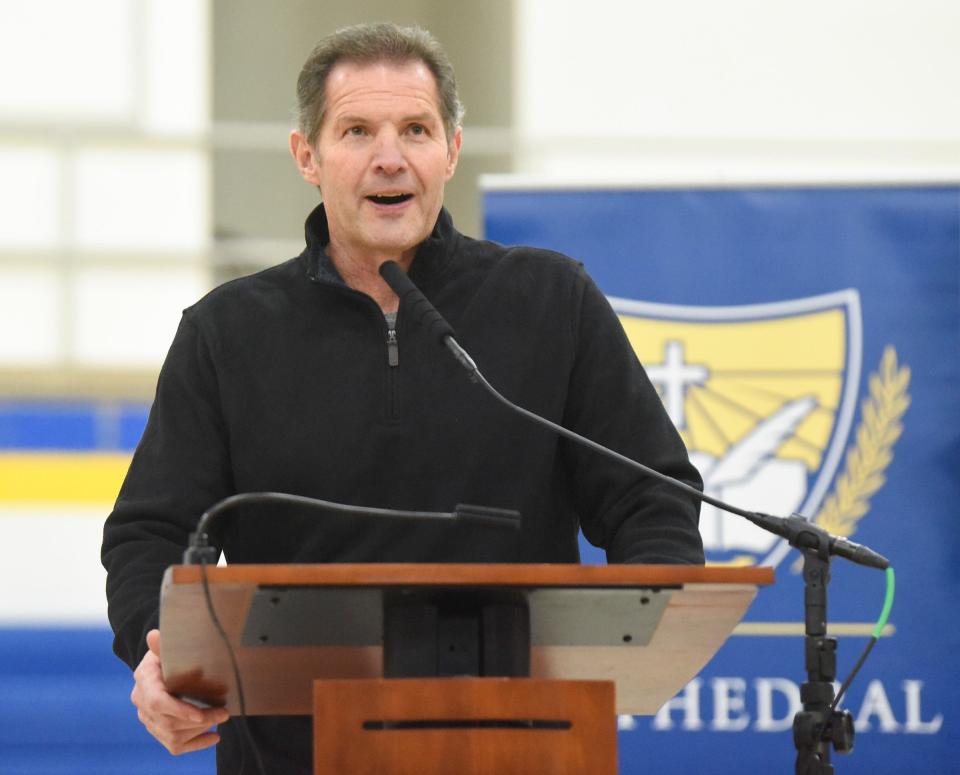 Cathedral Athletics Hall of Fame inductee Gary Fasching speaks at the ceremony Friday, Feb. 4, 2022, at Cathedral High School.