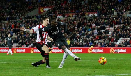 Football Soccer - Sunderland v Liverpool - Barclays Premier League - Stadium of Light - 30/12/15 Christian Benteke scores the first goal for Liverpool Reuters / Andrew Yates EDITORIAL USE ONLY. No use with unauthorized audio, video, data, fixture lists, club/league logos or "live" services. Online in-match use limited to 45 images, no video emulation. No use in betting, games or single club/league/player publications. Please contact your account representative for further details.