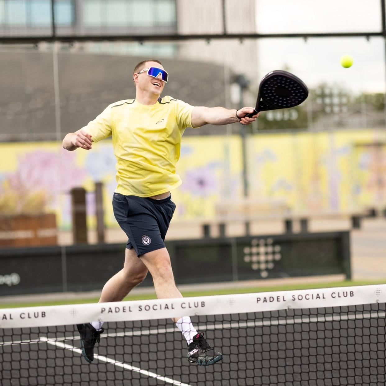 Alex Barton playing padel