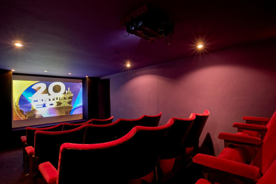 The manor house comes with its own retro cinema. (SWNS)
