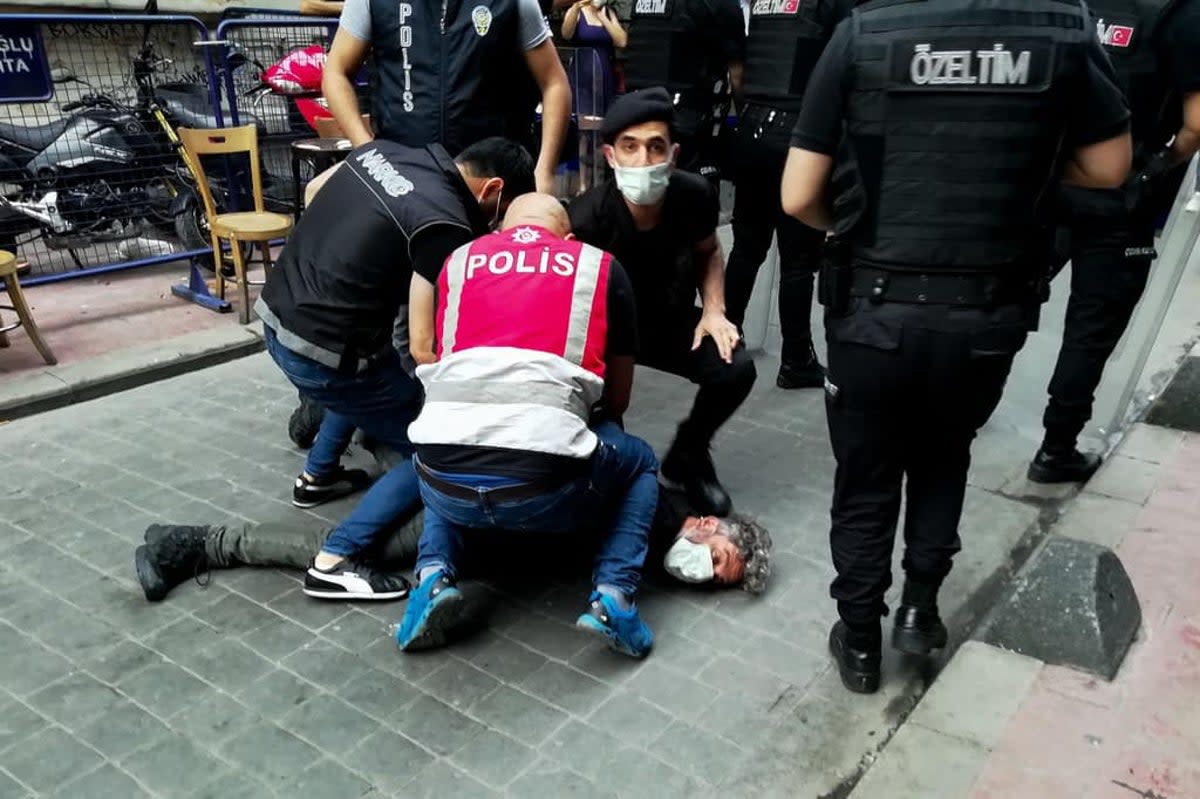 Bulent Kilic being arrested while covering the Pride march in Istanbul on 26 June, 2021 (Haco Biskin / Gazete Duvar / AFP)
