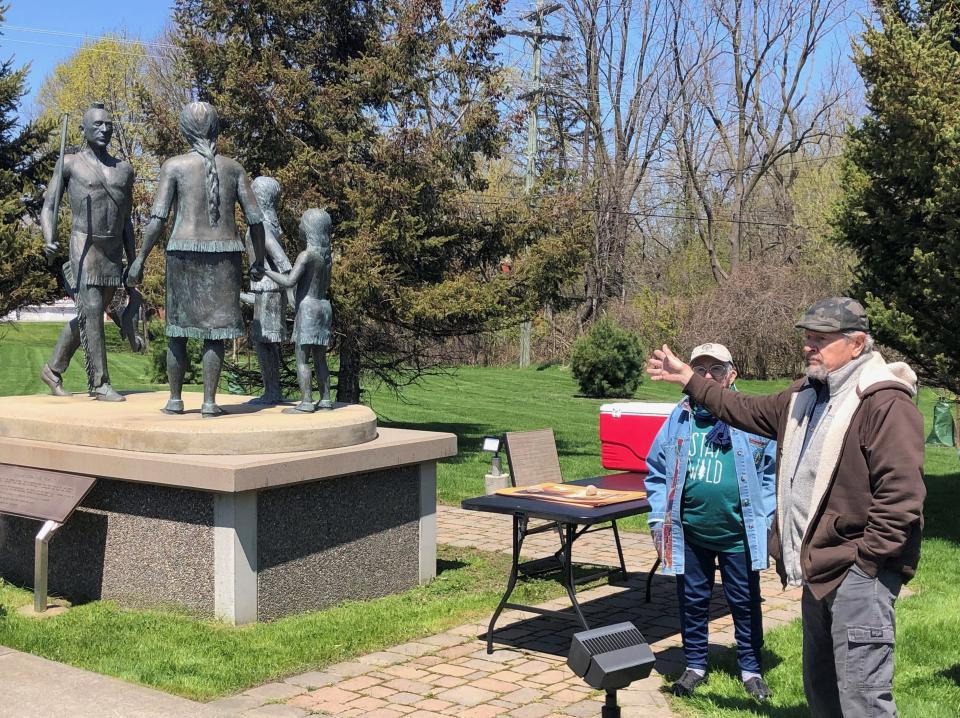 In this photo from an Arbor Day celebration last year, artist Wayne Williams created the Seneca Family Statue, which can be found at the corner of state Routes 5 and 20 and South Main Street in Canandaigua.