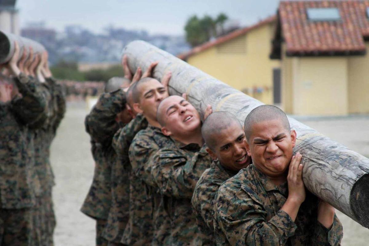The Marines are moving gradually and sometimes reluctantly to integrate  women and men in boot camp