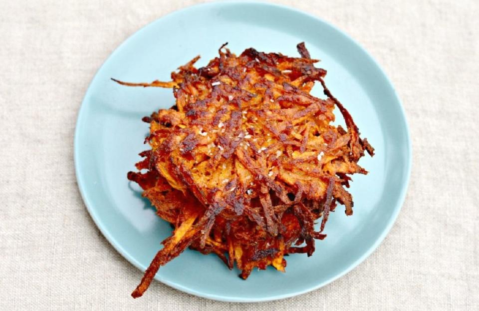 <p>Sub out a latke’s typical russet potatoes for sweet potatoes using this <a href="https://www.thedailymeal.com/easy-dishes-one-hour?referrer=yahoo&category=beauty_food&include_utm=1&utm_medium=referral&utm_source=yahoo&utm_campaign=feed" rel="nofollow noopener" target="_blank" data-ylk="slk:one-hour recipe;elm:context_link;itc:0;sec:content-canvas" class="link ">one-hour recipe</a>. For some added spice and tang, pair your sweet potato latkes with harissa yogurt made with Greek yogurt and harissa, a North African spice paste. </p> <p><a href="https://www.thedailymeal.com/best-recipes/sweet-potato-latkes-harissa-yogurt?referrer=yahoo&category=beauty_food&include_utm=1&utm_medium=referral&utm_source=yahoo&utm_campaign=feed" rel="nofollow noopener" target="_blank" data-ylk="slk:For the Sweet Potato Latkes with Harissa Yogurt recipe, click here.;elm:context_link;itc:0;sec:content-canvas" class="link ">For the Sweet Potato Latkes with Harissa Yogurt recipe, click here. </a></p>