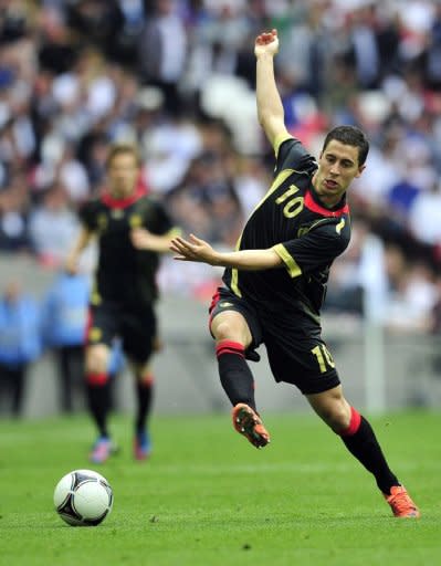 Belgium's Eden Hazard, seen here in action during their International friendly match against England, at Wembley Stadium in London, on June 2. Hazard completed his Â£32 million transfer from French club Lille on Monday after the 21-year-old had initially suggested he was likely to join either Manchester City or Manchester United ahead of Chelsea