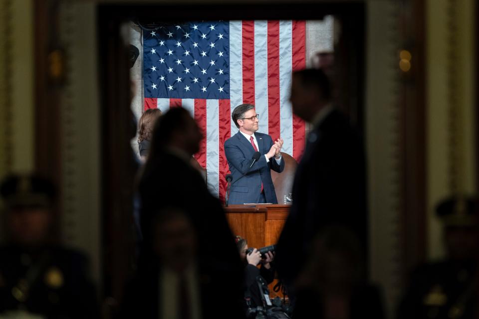 Speaker of the House Rep. Mike Johnson, R-La., applauds before the arrival of President Joe Biden in the House chamber at the U.S. Capitol Thursday, March 7, 2024, in Washington.