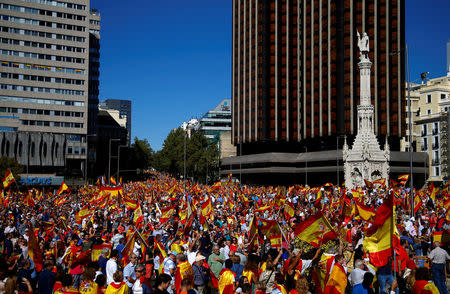 People wave Spain´s flag at a pro-union demonstration in Madrid, October 7, 2017. REUTERS/Javier Barbancho