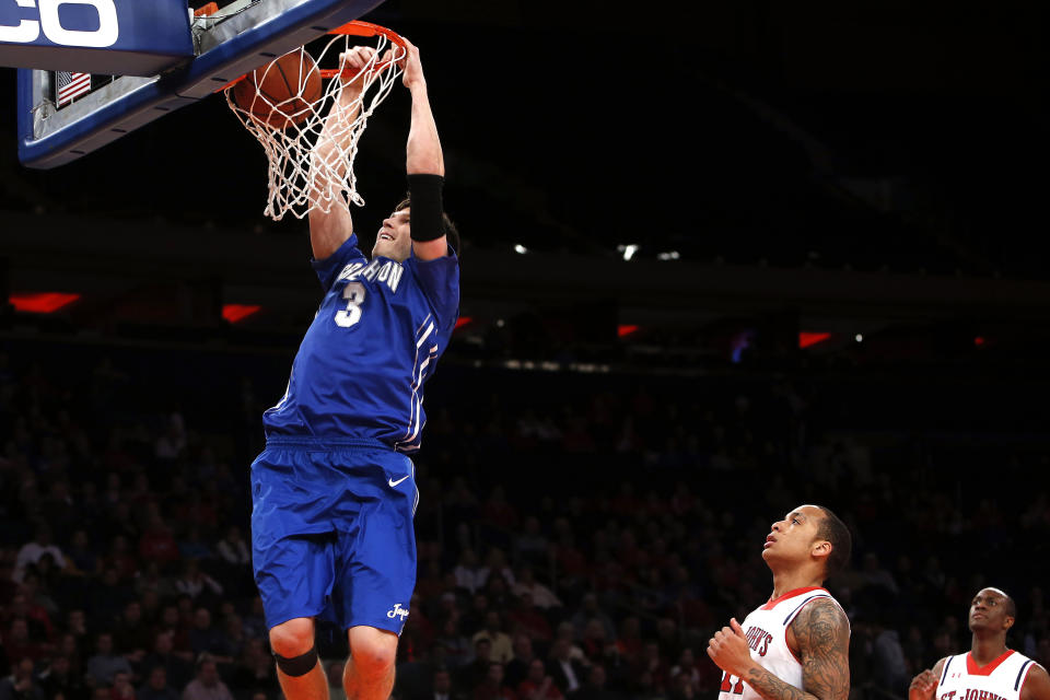 Creighton's Doug McDermott (3) goes to the basket against St. John's during the first half of an NCAA college basketball game, Sunday, Feb. 9, 2014, in New York. (AP Photo/Jason DeCrow)