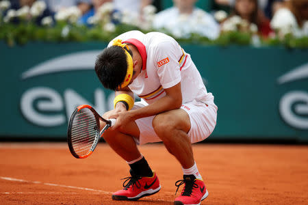 Tennis - French Open - Roland Garros, Paris, France - May 30, 2018 Japan's Kei Nishikori reacts during his second round match against France's Benoit Paire REUTERS/Pascal Rossignol