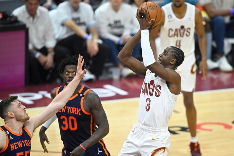 Cleveland Cavaliers guard Caris LeVert shoots against New York Knicks center Isaiah Hartenstein during Game 1 of the 2023 NBA playoffs at Rocket Mortgage FieldHouse, April 15, 2023 in Cleveland.