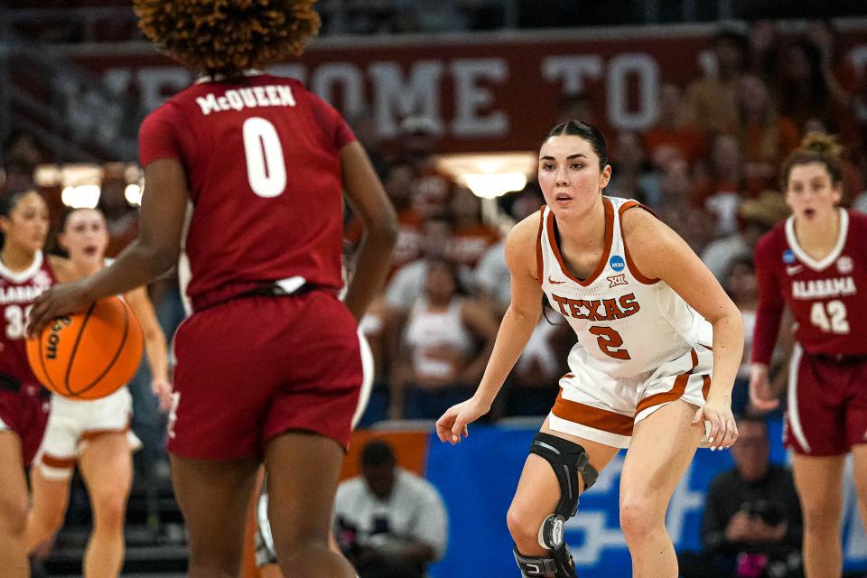 Texas guard Shaylee Gonzales defends against Alabama's Loyal McQueen during their NCAA second-round game last weekend. The Longhorns will face North Carolina State on Sunday with a trip to the Final Four on the line.