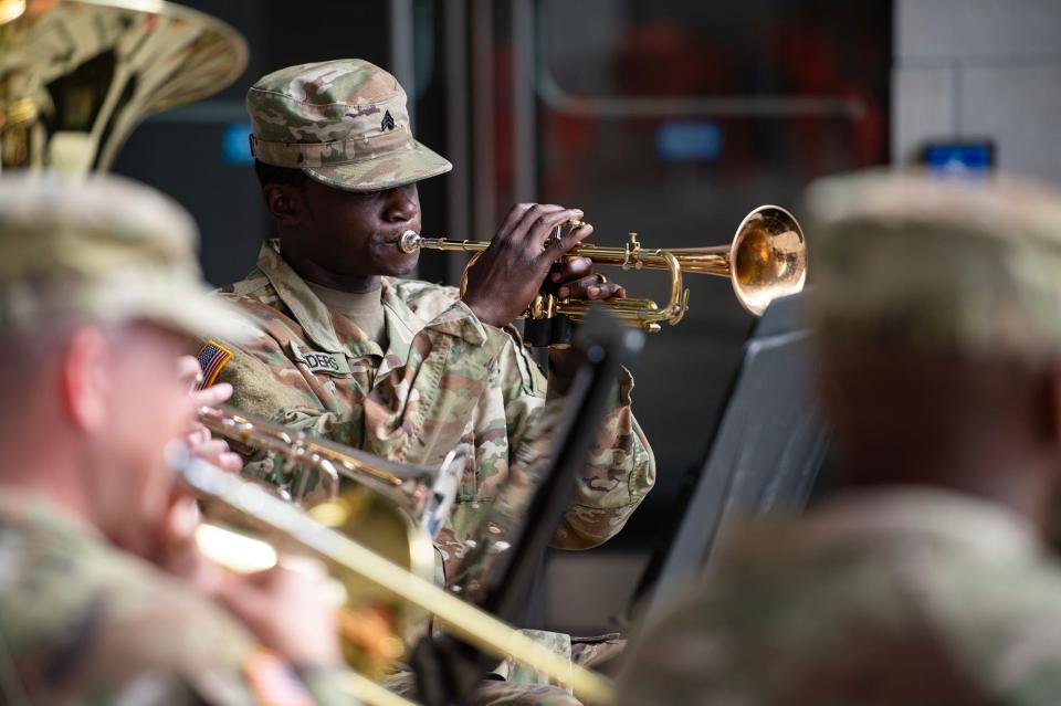 Sgt. Avery Sanders plays the trumpet as part of the Magnolia Brass Quintet of the 41st Army Band during the Veterans Day ceremony at Two Mississippi Museums in Jackson on Thursday, Nov. 9, 2023.