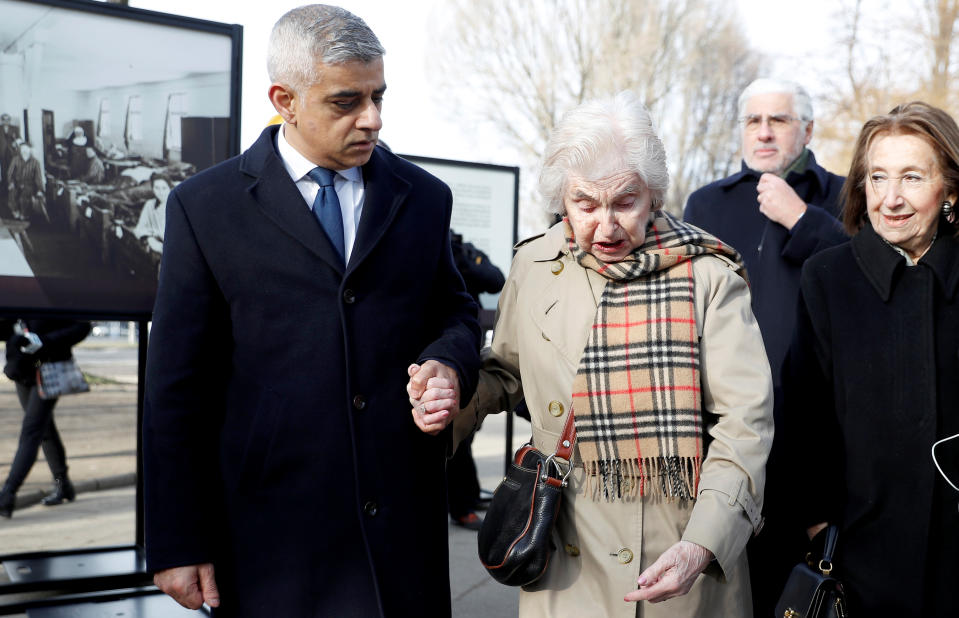 Sadiq Khan and Holocaust survivor Renee Salt arrive to attend the unveiling of a plaque marking the financial support of London for the Auschwitz-Birkenau Foundation.