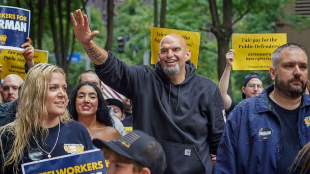 PHOTO: John Fetterman, Pennsylvania's Democratic lieutenant governor and senate candidate, waves to supporters during a Labor Day parade in Downtown Pittsburgh, on Sept. 5, 2022. (Steve Mellon/Pittsburgh Post-Gazette via AP)